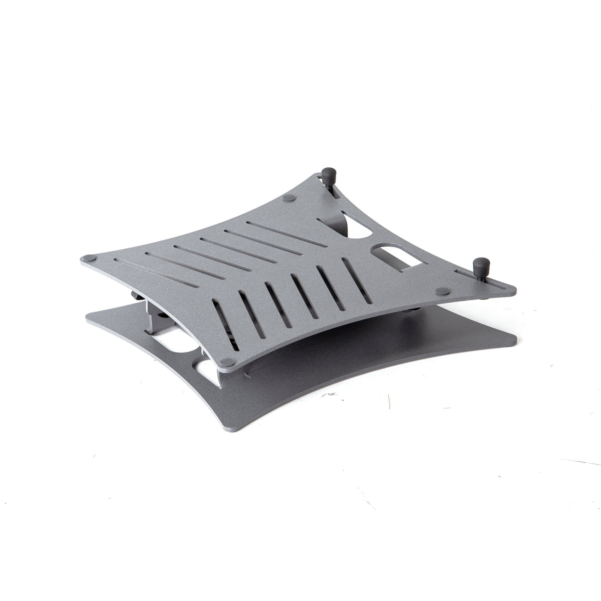 12195 laptop stand folded flat with slotted platform lowered over the steel base and rubber feet visible, K&M
