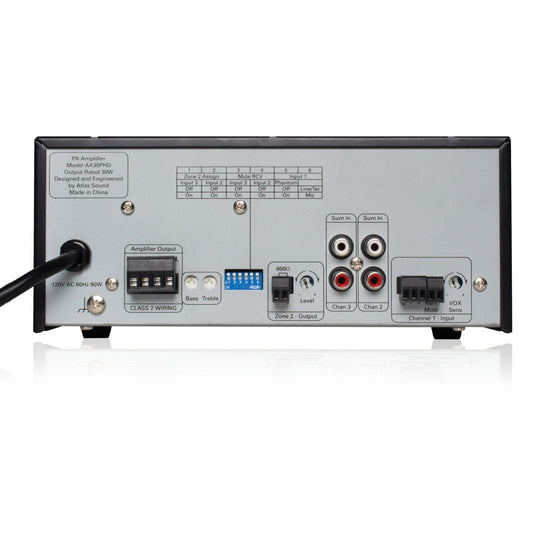 AA30PHD rear panel with Euroblock amplifier output, DIP switch bank, bass and treble trims, RCA Sum In jacks and Channel 1 input terminals, AtlasIED