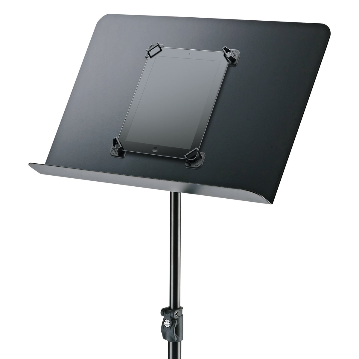 19708 magnetic tablet holder set mounted on a black music stand desk, tablet held at all four corners above the stand clamp, K&M