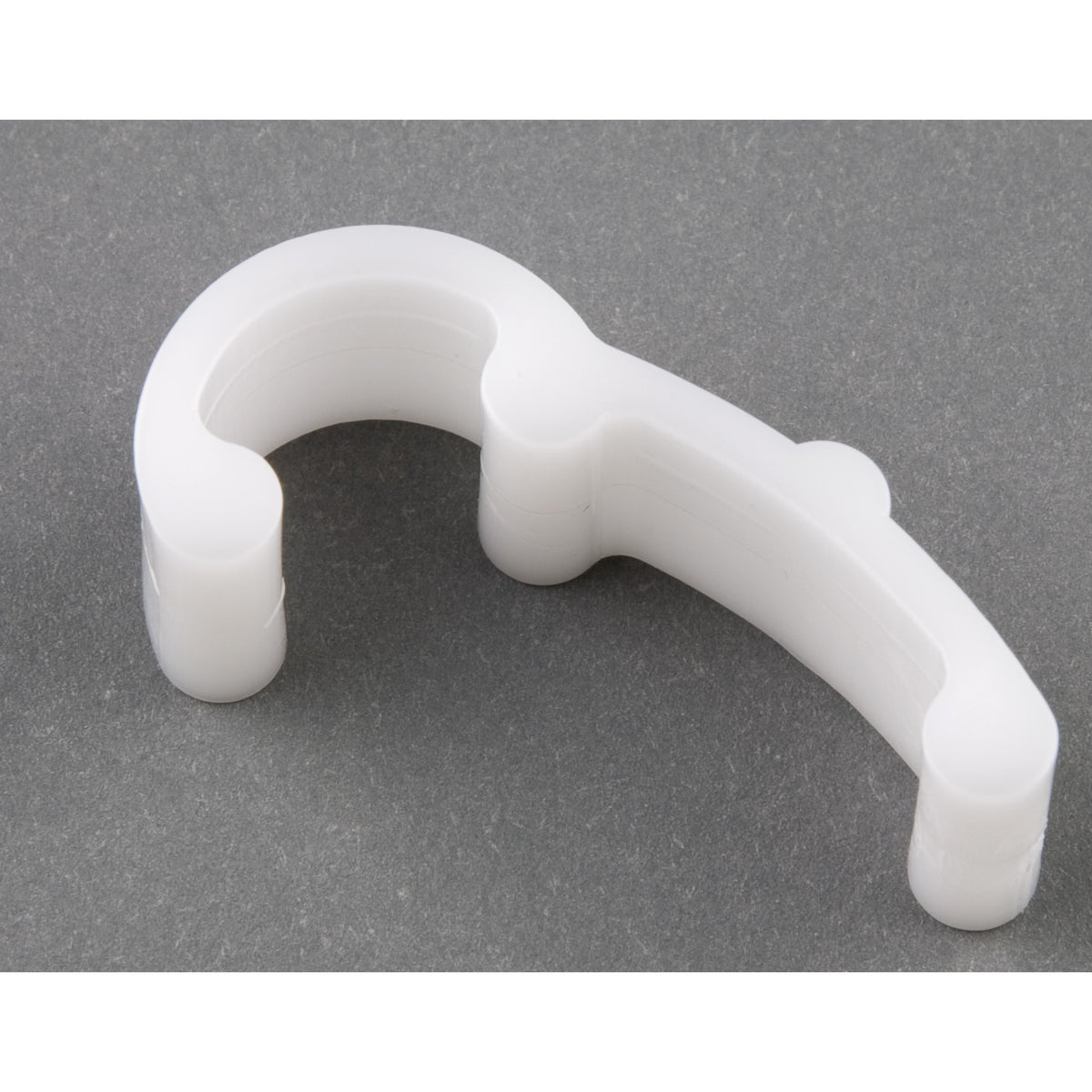 P1196 retaining clip for Venue transmitter, angled view of white molded plastic dual snap-on arms, Lectrosonics