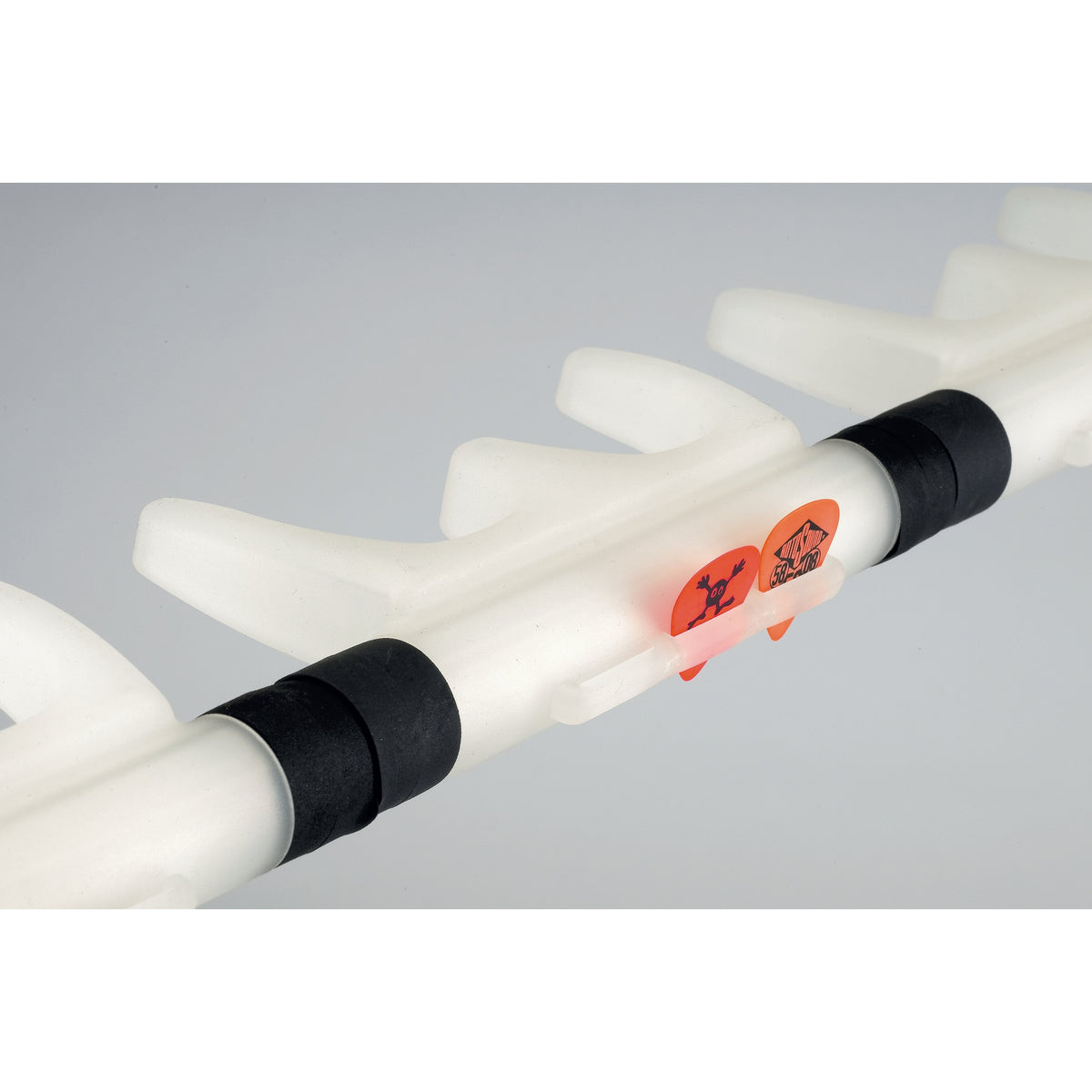 17515 guitar stand neck rail close-up with two orange guitar picks held in the integrated pick holder, K&M