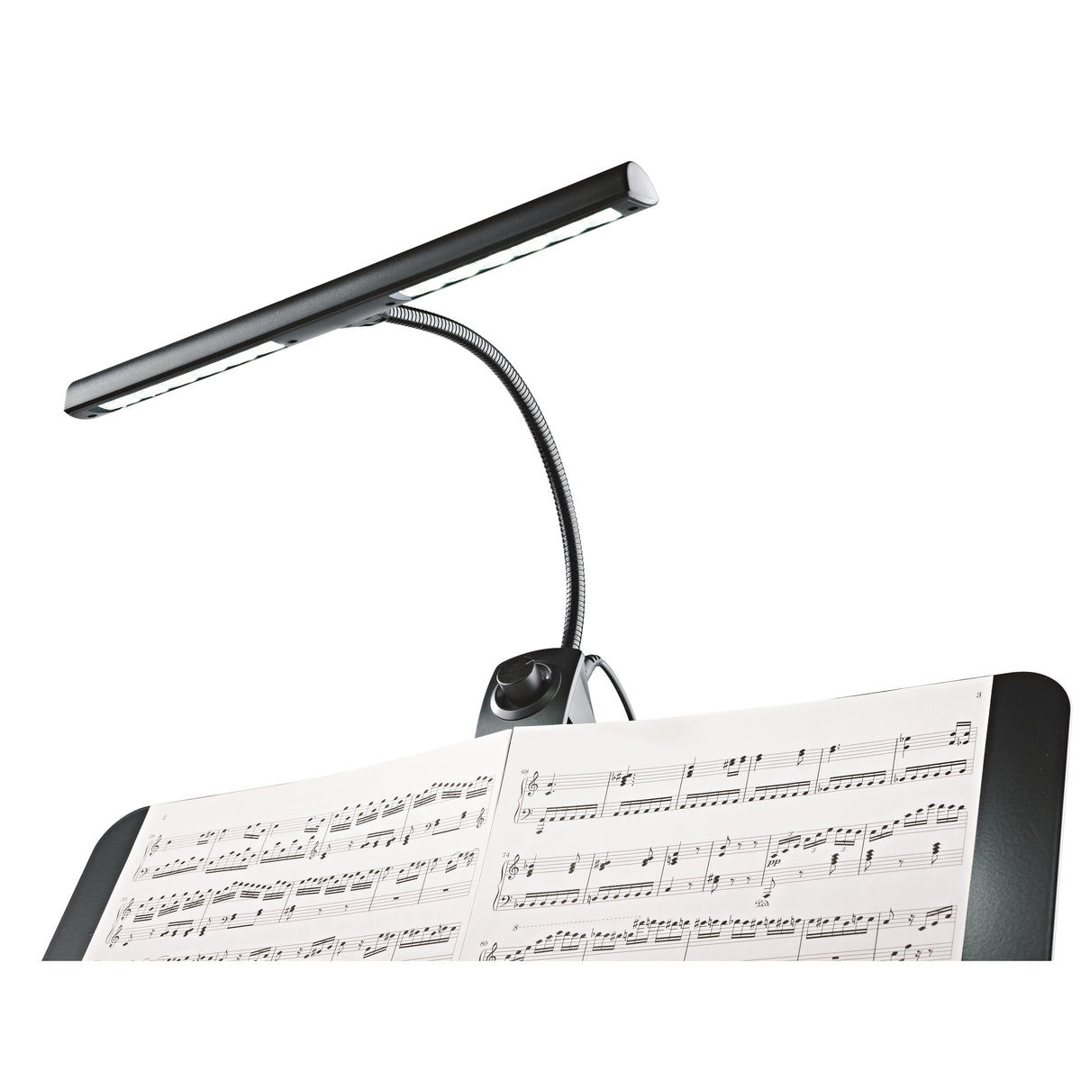 12295 music stand light clipped above an open sheet music score, LED bar on gooseneck lighting the page, K&M