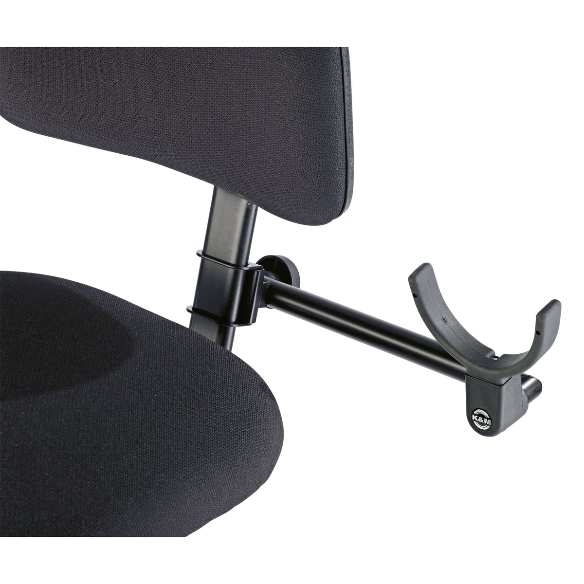 13497 double bass holder in use clamped to the backrest post of a black upholstered bass chair with cradle extended, K&M