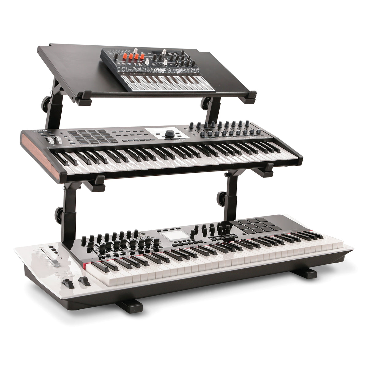 18828 Omega table stand basic support in a three-tier setup with 18811 stackers, a synth on a top shelf above two keyboards, K&M