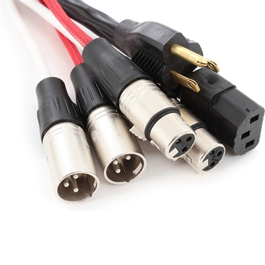 Close-up of ProCo Sound EC2 connector ends: male and female XLR plugs alongside AC power plug and IEC connector