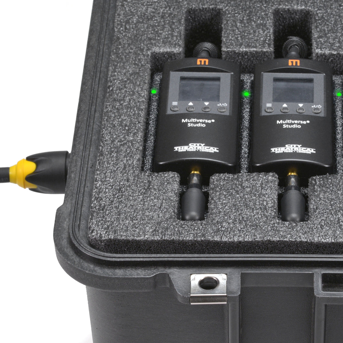 Multiverse Studio Kit 5938 contactless charging detail with two Studio receivers showing green charge LEDs in foam, City Theatrical