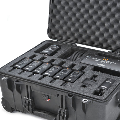 Multiverse Studio Kit 5938 open angled view of rolling case with receivers, transmitter, coiled cable, RadioScan and DMXcat in foam, City Theatrical