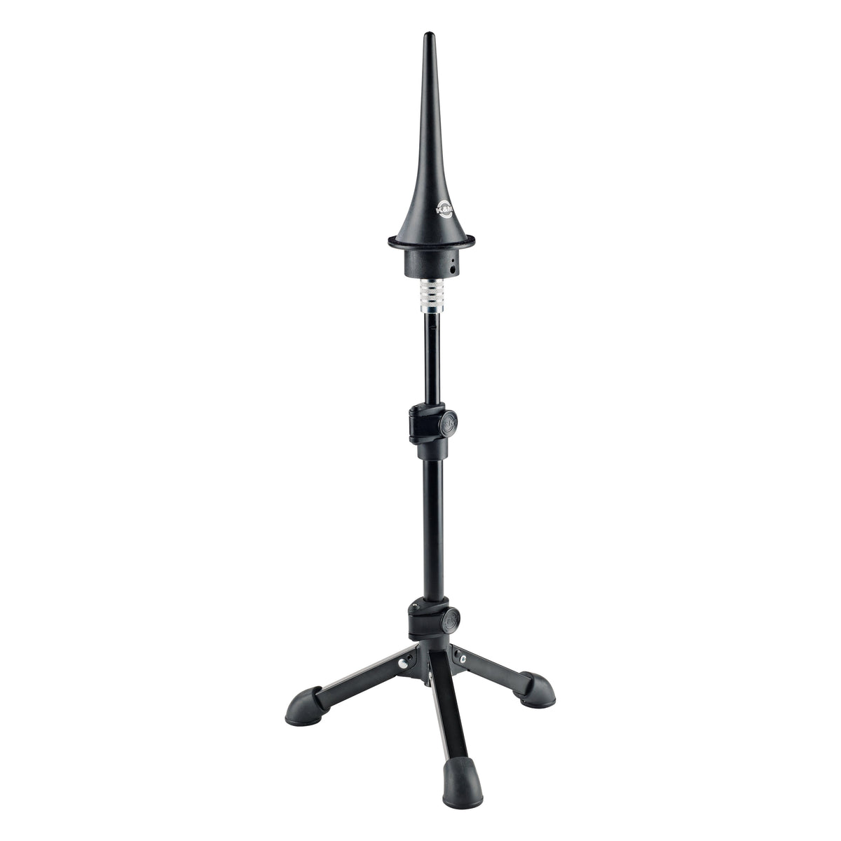 15282 reducing thread adapter in use between a tripod stand shaft and a black conical peg holder with the knurled silver adapter visible, K&M