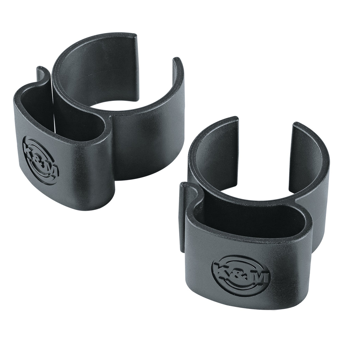 21406 plastic cable clamps pair, product shot showing open C-shaped stand clip and cable channel with embossed K&M logo, K&M