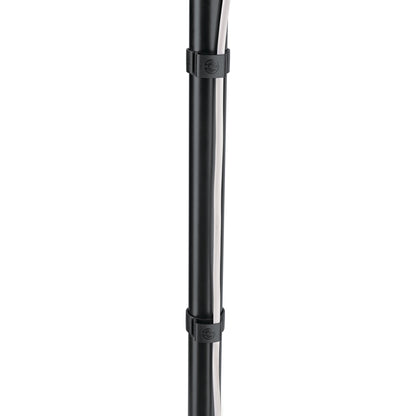 21406 cable clamps in use, two clamps spaced along a black stand pole securing a white cable, K&M