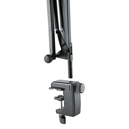23850 desk arm clamp detail showing the table clamp separated from the arm's mounting post, with screw clamp and K&M-branded locking knob, K&M
