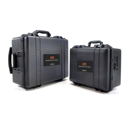 Multiverse Studio Kit and smaller Add-On Kit cases shown closed side by side with AC inlet panel visible, City Theatrical