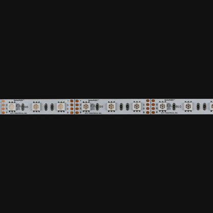 QolorFLEX 5050 12V RGB LED tape unlit detail showing 5050 emitters, R/G/B solder pads and cut marks, City Theatrical