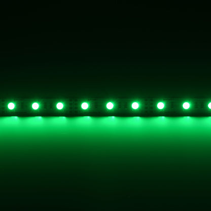 QolorFLEX 12V RGB LED tape lit green with QolorFLEX and City Theatrical Inc. markings visible on the strip, City Theatrical