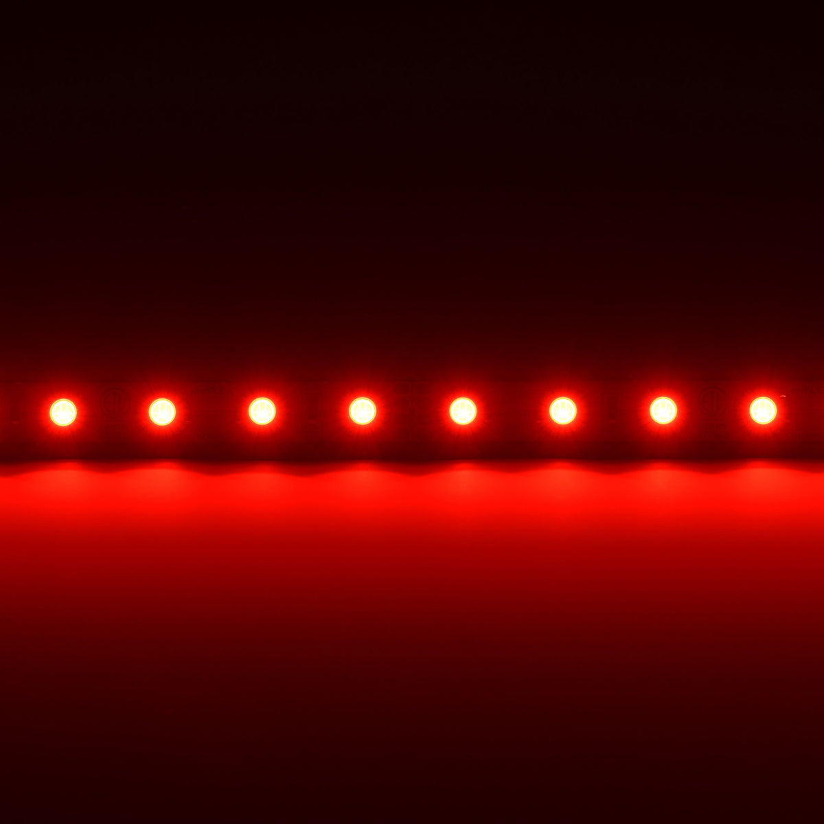 QolorFLEX 5050 24V LED tape illuminated in red, showing evenly spaced emitters and smooth wash output, City Theatrical