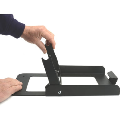 4305 ETC cyc base in use with hand raising the hinged mounting bracket upright from the floor plate, City Theatrical