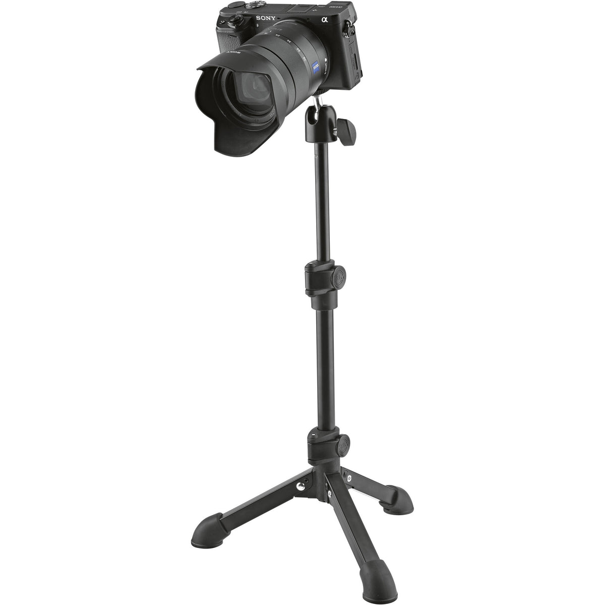 KM 19782.100.55 tabletop tripod supporting a mirrorless camera with zoom lens on the 1/4-inch thread, K&M
