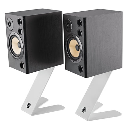 26773 Z-shaped table monitor stand pair in pure white, in use supporting two black wood-finish studio speakers with yellow cone woofers, K&M