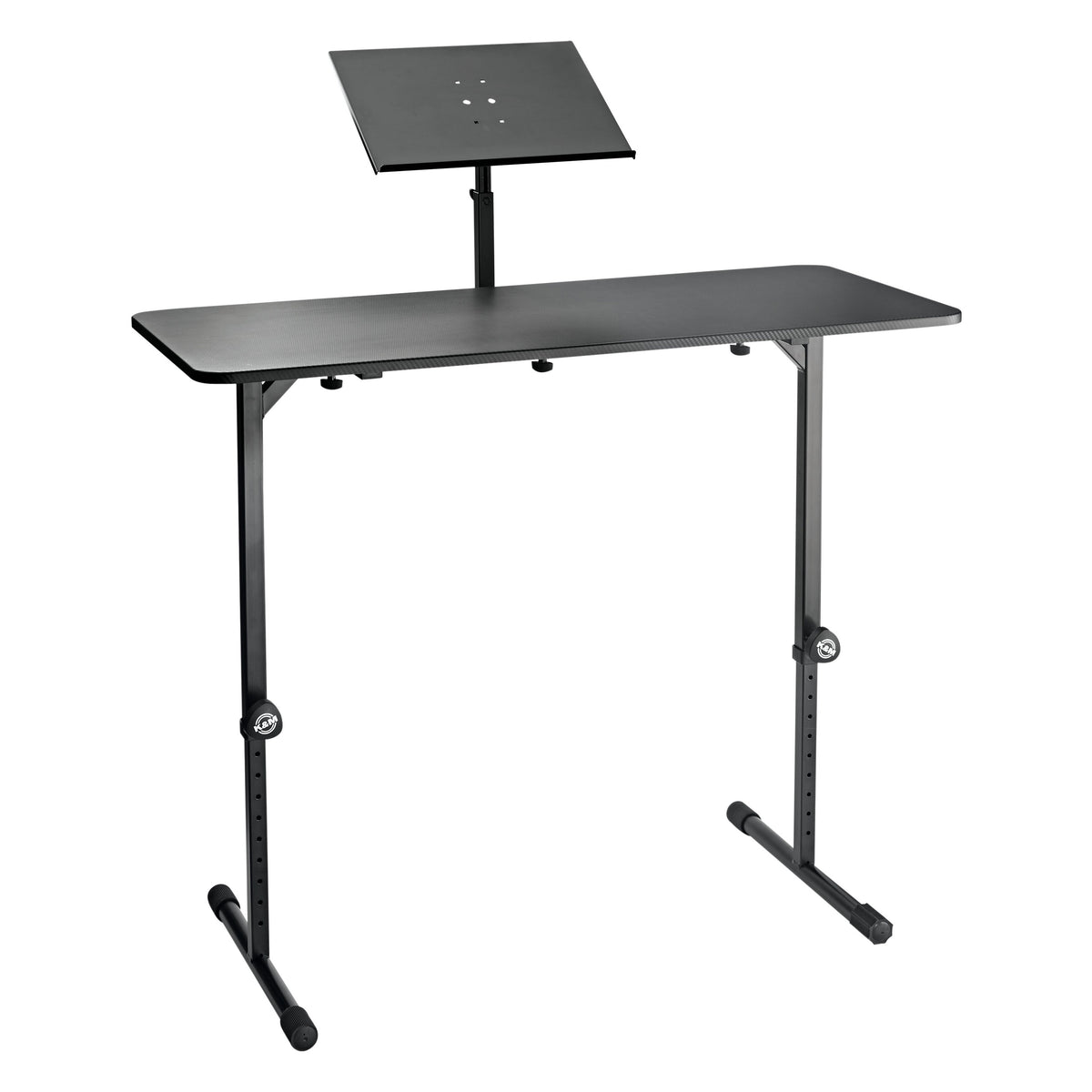 12162 DJ table extension tray in use mounted on a black DJ table with adjustable-height legs and T-shaped feet, K&M