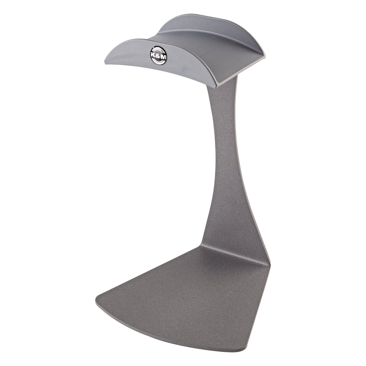 16075 headphone table stand front three-quarter view showing curved cradle with K&M logo and wide angled steel base in gray, K&M