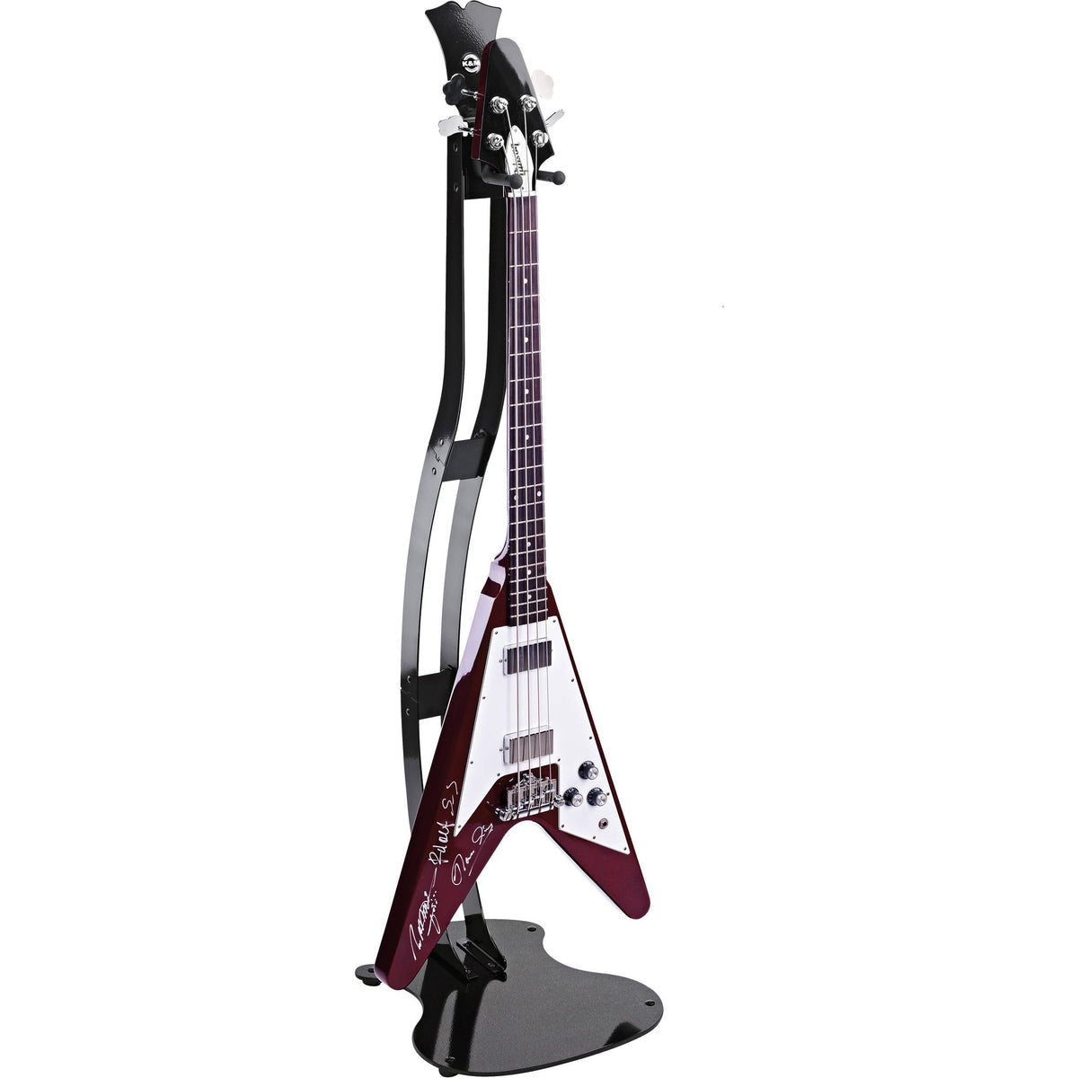 KM 17640.000.37 guitar stand in use holding a red Flying V bass by the neck yoke, K&M