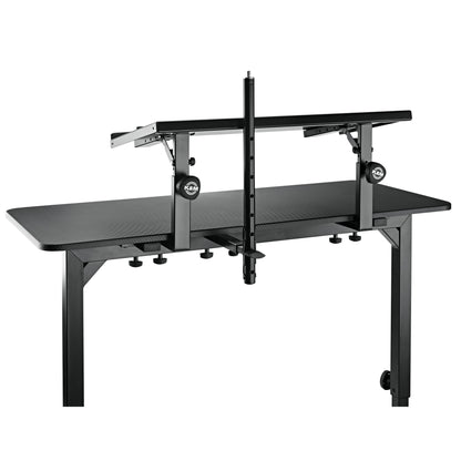 18803 Omega keyboard stand table rear view showing tiered tabletop extension, K&M logo clamp knobs and center perforated pole, K&M