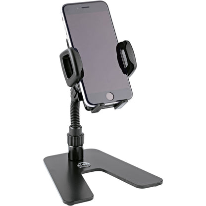 KM 19746.000.55 desktop phone stand in use holding a smartphone upright in the padded clamp, K&M