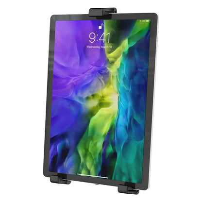 Biobased tablet holder front view gripping a tablet in portrait orientation with top and bottom clamp tabs holding the screen edges, K&M