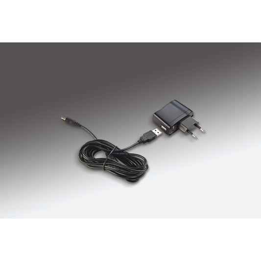 12298 LED piano lamp accessories showing black USB power adapter with EU plug and coiled USB-to-DC power cable, K&M