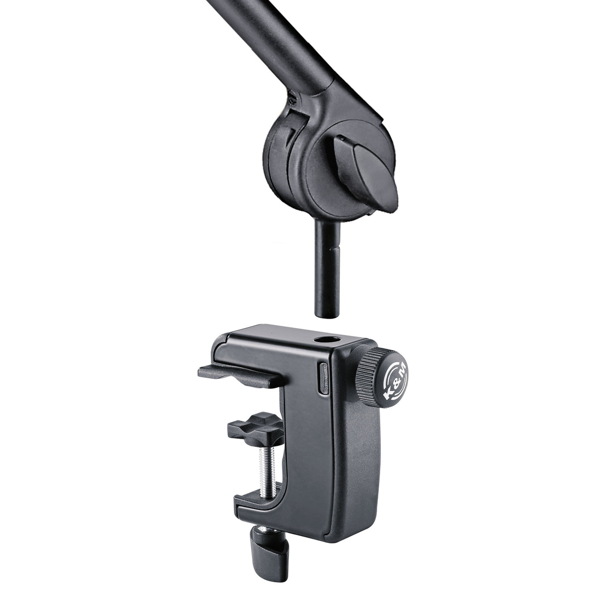 23865 desk arm clamp detail showing pivot joint with locking wing knob, mounting spigot above the table clamp and K&M logo screw knob, K&M