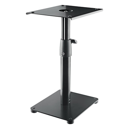 26775 desktop monitor stand full front three-quarter view showing square top plate, black telescopic column with clamp collar and flat base plate with rubber feet, K&M