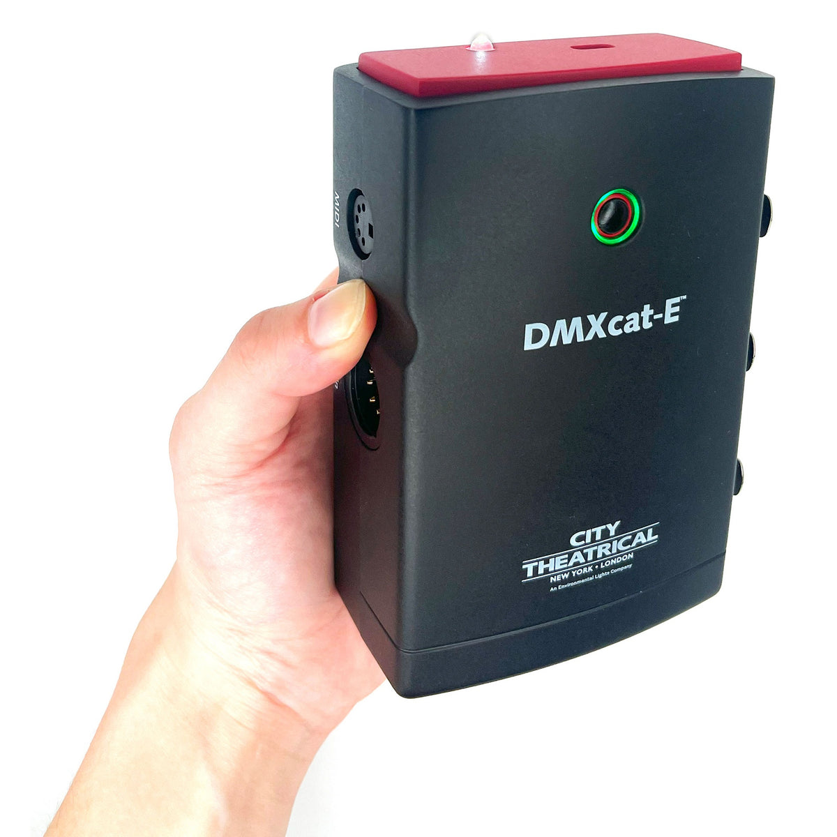 DMXcat-E 6100 held in hand showing red top cap flashlight lit and green status LED ring, City Theatrical