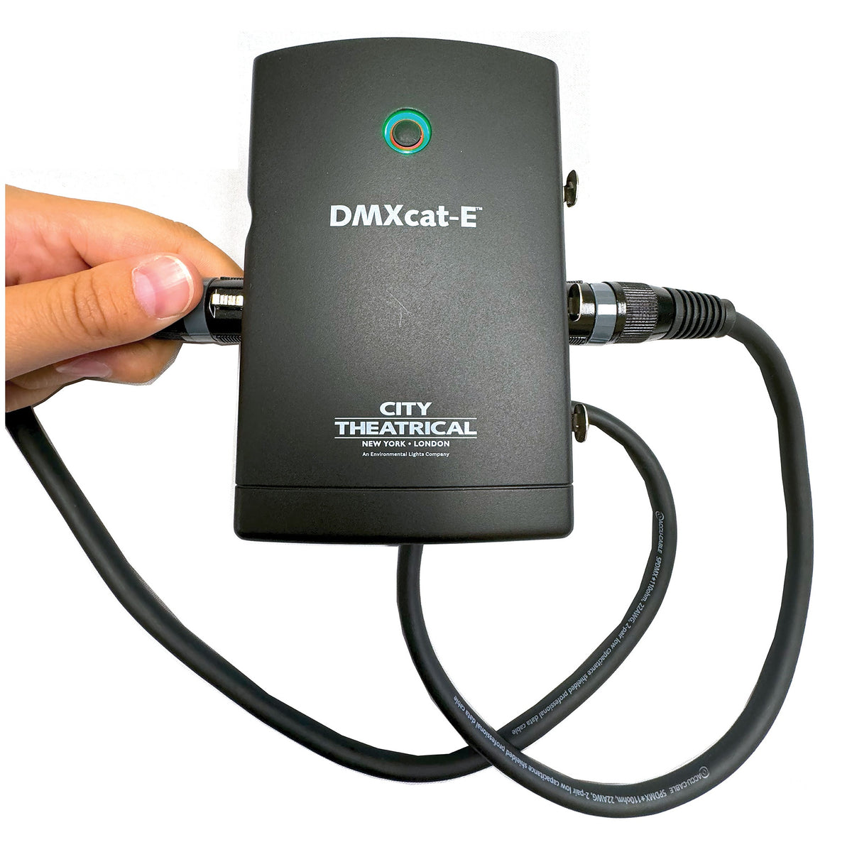 DMXcat-E 6100 in hand with DMX cable looped from DMX In to DMX Out for cable testing, City Theatrical