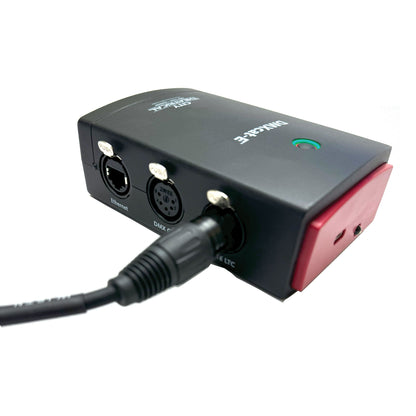 DMXcat-E 6100 angled side view with 3-pin XLR cable in SMPTE LTC port next to Ethernet and DMX Out, City Theatrical