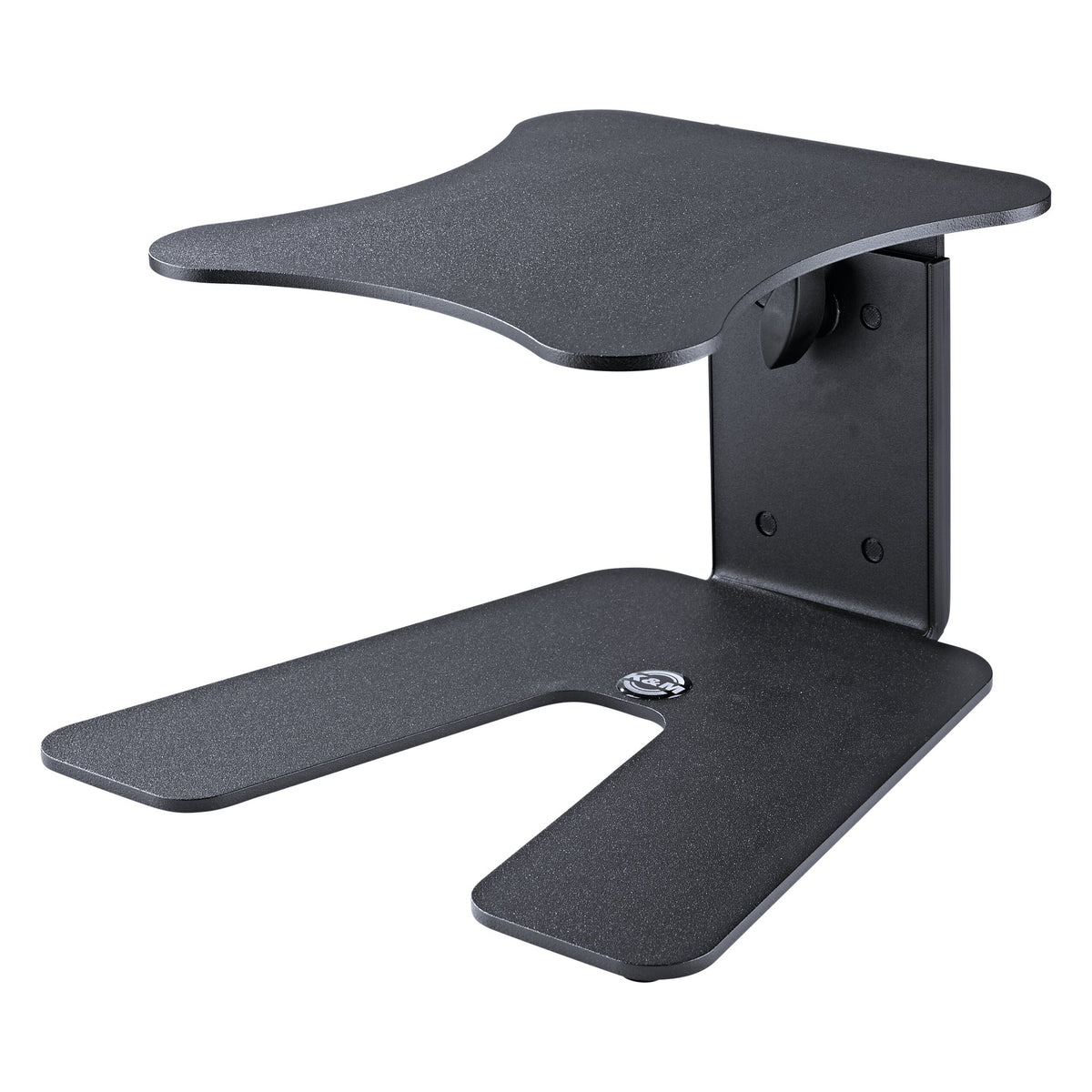 Table monitor stand at lowest height setting from the side, showing compact steel column and U-shaped base plate with K&M badge, K&M