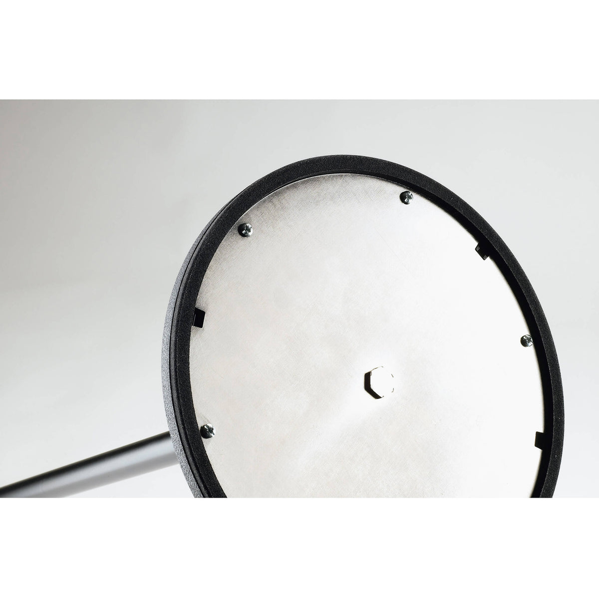 26050 studio mic stand underside of round base showing metal bottom plate, mounting screws and hex nut at center, K&M