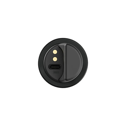 NCHH handheld transmitter bottom end cap detail with USB-C charging port and gold docking contacts, Audix