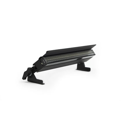 VDO Sceptron XB with Graze optic and glare shield mounted on tilting floor feet, Martin Lighting
