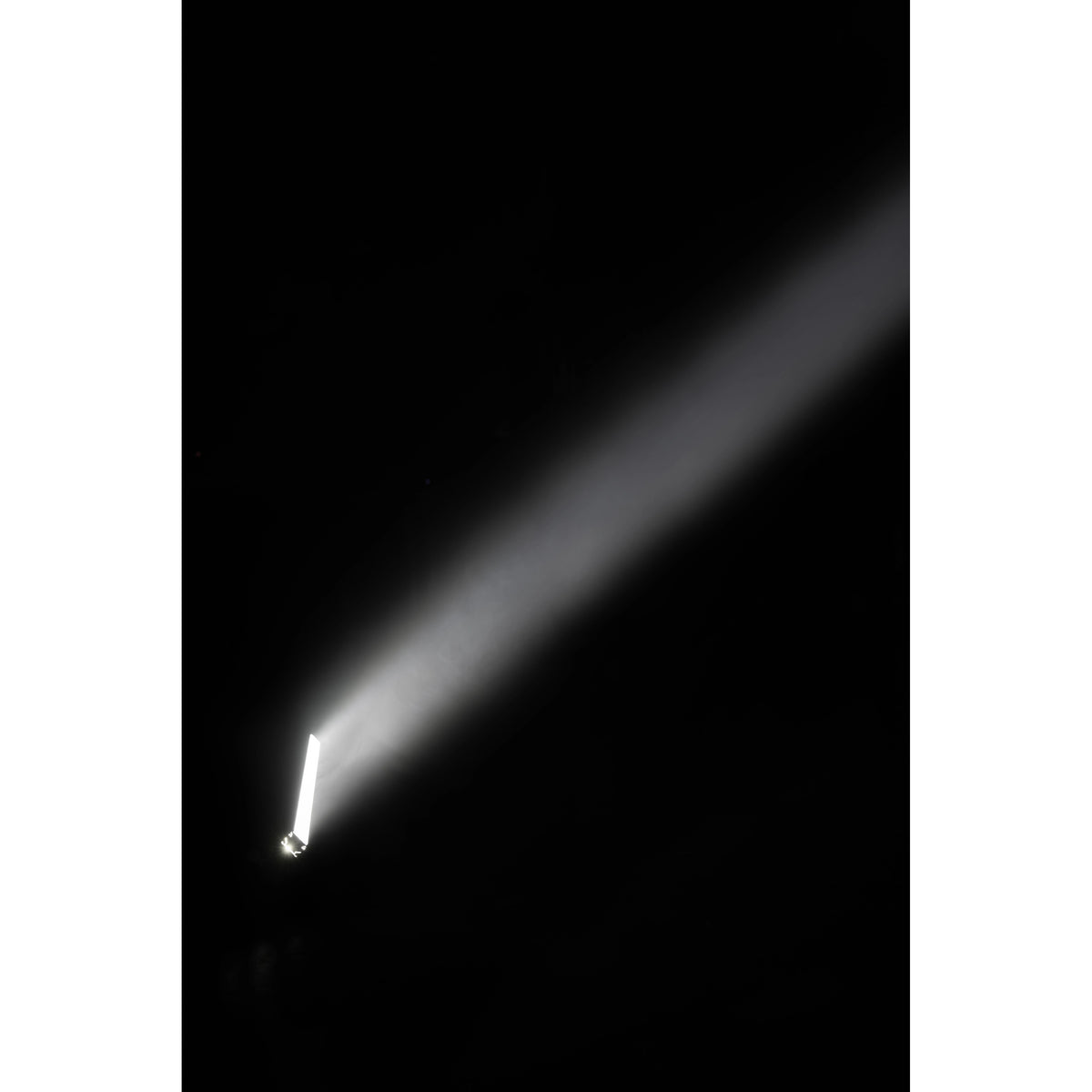 VDO Sceptron XB projecting a tight white beam through haze against black, Martin Lighting