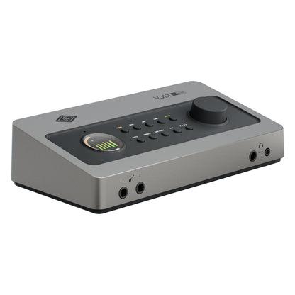 Volt 4P Max G2 USB audio interface three-quarter view showing brushed silver chassis, large monitor knob and color LED metering display, Universal Audio