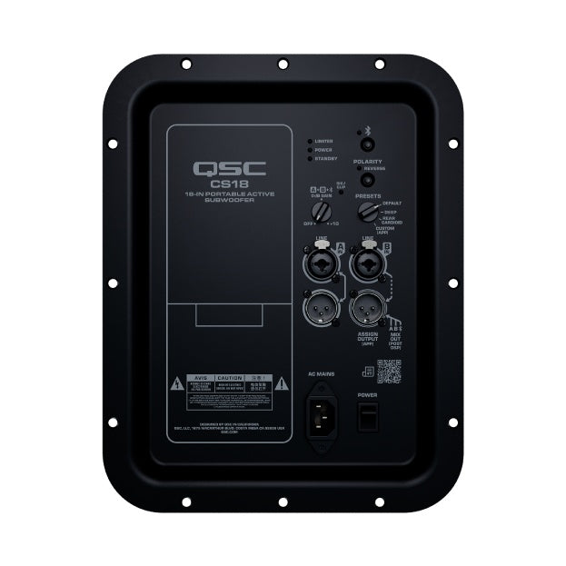 CS18-NA rear amplifier panel close-up showing XLR/combo line inputs and outputs, preset selector, polarity switch, IEC AC mains inlet and power switch, QSC