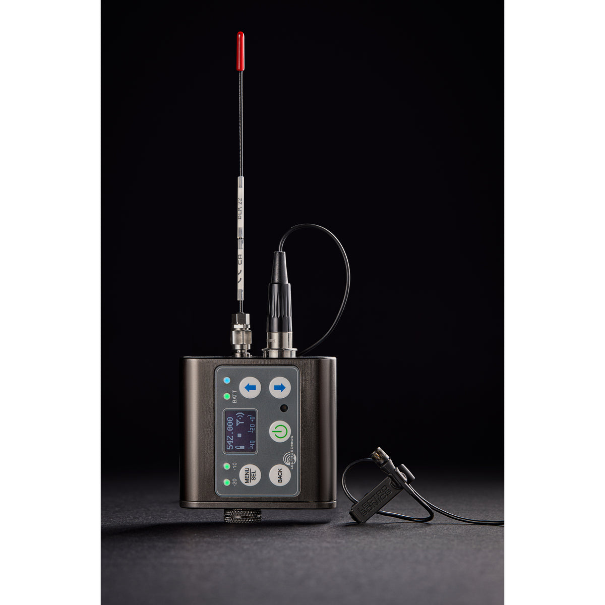 L1 Sonaura lavalier connected to DBSM belt-pack transmitter showing OLED frequency display and whip antenna, Lectrosonics
