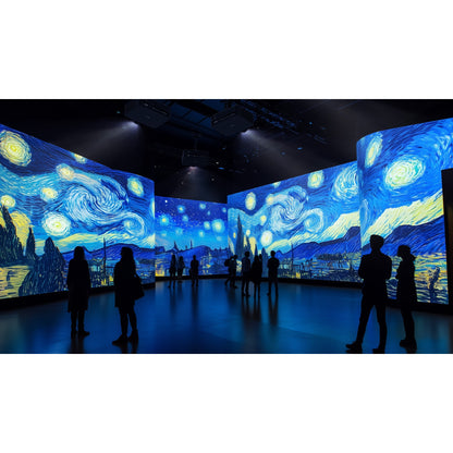 ZK1000 laser projectors ceiling-mounted in an immersive art exhibition with Starry Night style projections on curved walls and visitors silhouetted, Optoma