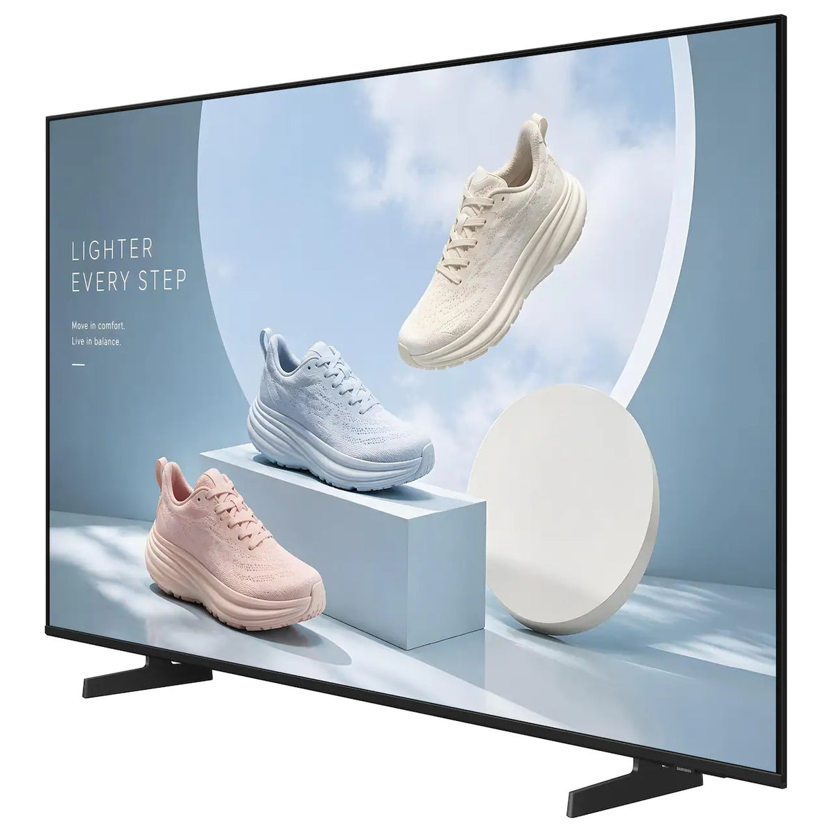 BE75HX-H 75" business display angled left three-quarter view on black feet showing 'Lighter Every Step' sneaker signage content, Samsung