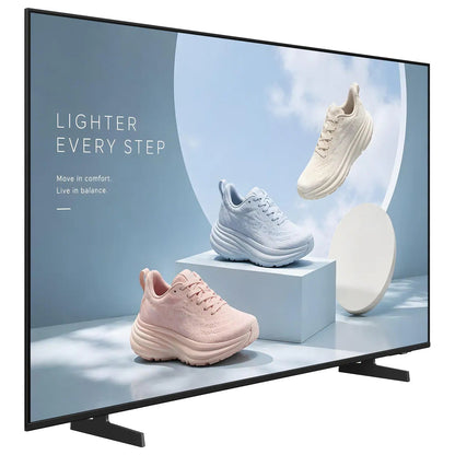 BE75HX-H 75" business display angled right three-quarter view showing slim bezel and tabletop feet with sneaker signage content, Samsung