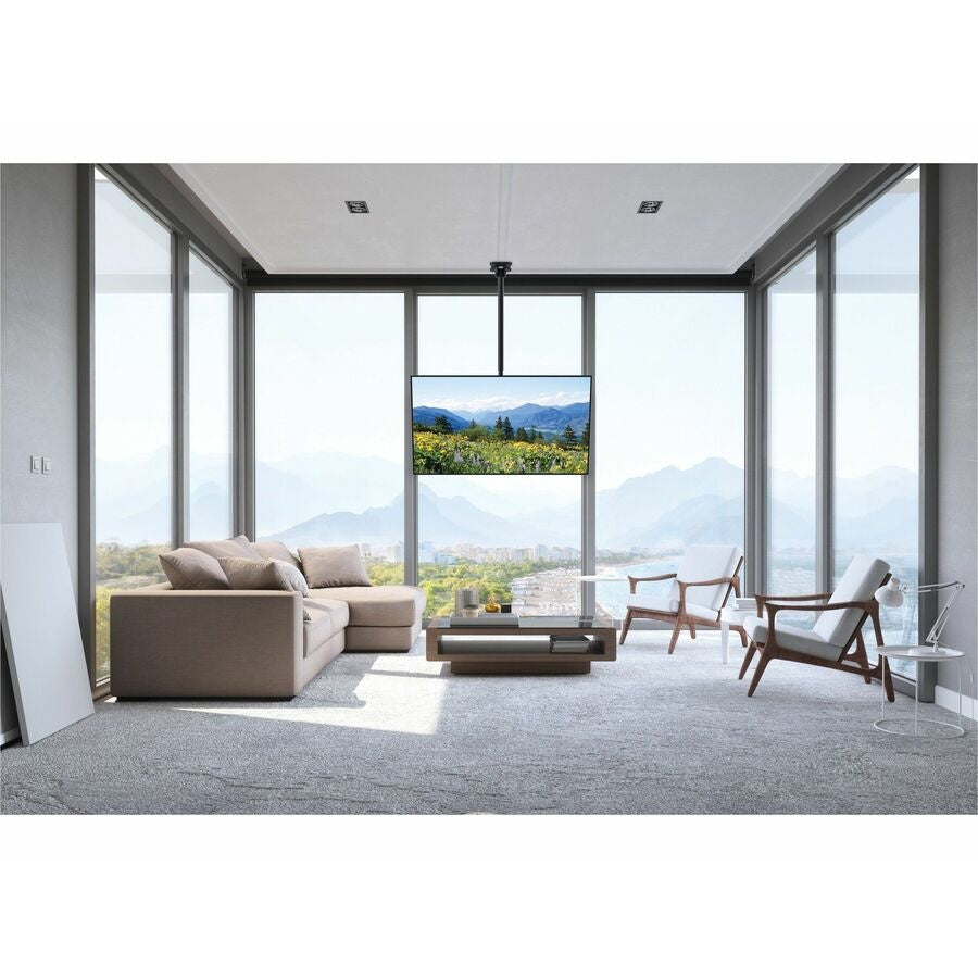 PCM150 ceiling mount in use suspending a flat panel TV from the ceiling in a window-lined living space, Peerless-AV