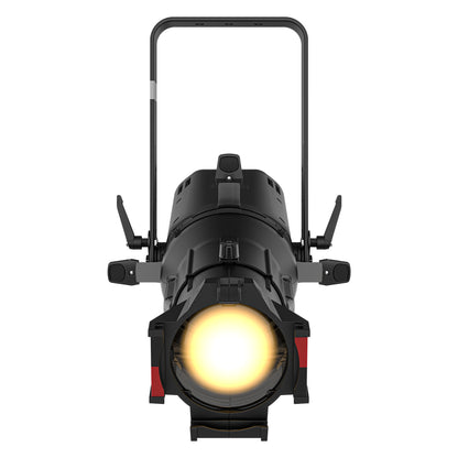 Ovation Rêve E2 LED ellipsoidal front view showing illuminated warm-white output through the lens and gel frame slot, Chauvet Pro