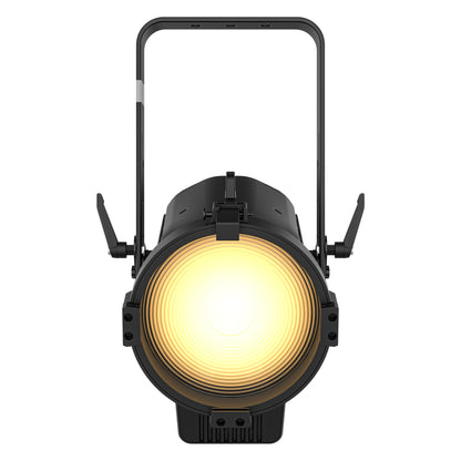 Ovation Reve F2 RGBCAM LED Fresnel front view with warm white lens output and barndoor mounting brackets, Chauvet Pro