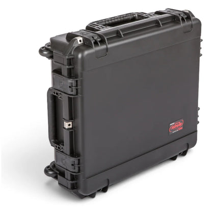 3I-2421-7BE iSeries case shown on edge with wheels down and pull handle stowed, SKB