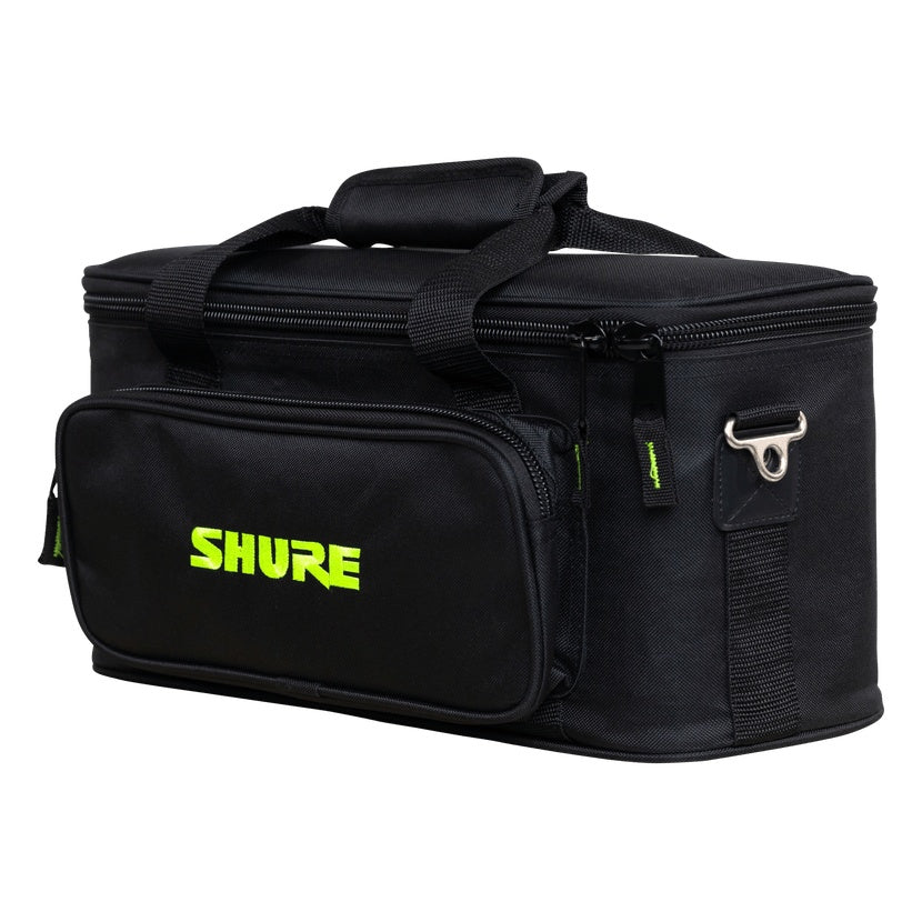 SH-MICBAG12 microphone bag angled front-right view showing carry handles, front zip pocket with green Shure logo and metal D-ring shoulder strap attachment, Gator